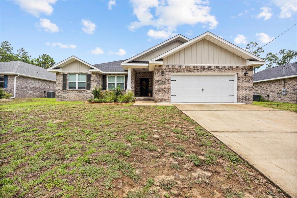 Welcome to your new home! This is a spacious 4-bedroom, 2-bath home featuring an open layout with vaulted ceilings and modern finishes throughout. The kitchen is designed for both functionality and style, offering a large island with built in sink and dishwasher. All kitchen appliances are stainless steel with smart refrigerator to convey! Granite countertops throughout, slow-close cabinets and drawers, and a walk-in pantry. The versatile fourth bedroom can be used as a home office, playroom, or flex space. The split floor plan enhances privacy, with the primary suite fitted with tray ceilings and LED lighting. The primary bath includes a large tiled walk-in shower would double heads, garden tub, double vanities and water closet. There is also a large linen closet, as well as a walk through closet that wraps around to a laundry room that opens back to the main living area. The large backyard is completely fenced for added privacy and endless entertainment possibilities. There is a covered front porch for those lazy days drinking coffee and enjoying the outdoors. Location provides convenient access to 87, 98, I-10, and all surrounding areas. Assumable low-interest loan for qualified buyers. Vinly hurricane shutters available (in garage in tubes).
