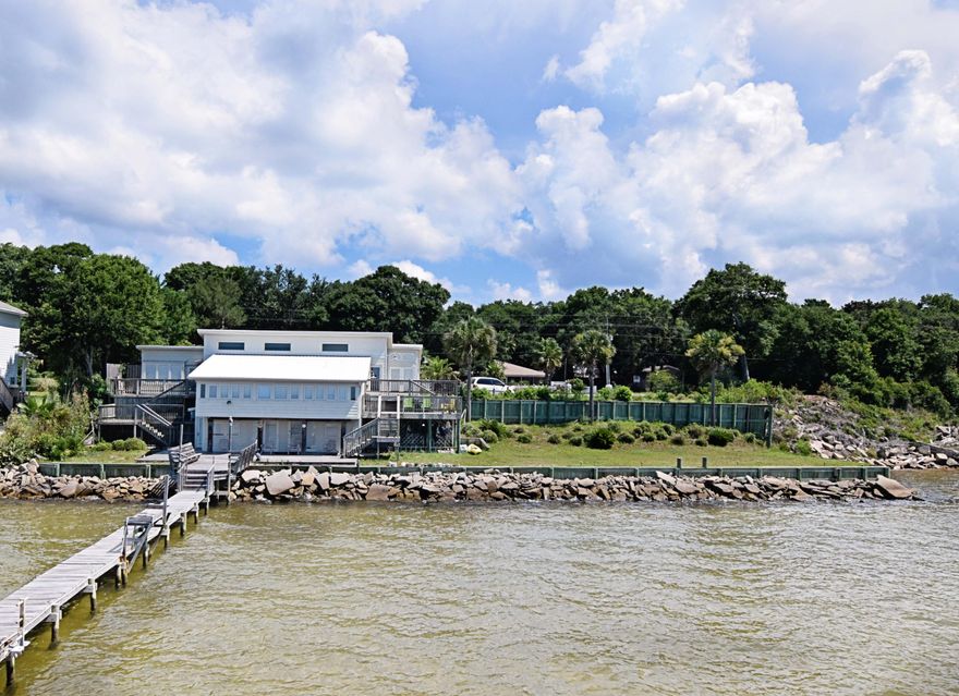 Affordable waterfront living! What a home! Beautiful view & right on the water!! This lovely 3bed/3full-bath beach cottage-style home is a definite must see, fully equipped for life on the water. Inside you'll find a bright, airy and open kitchen with updated cabinetry and appliances. Tile and hardwood flooring throughout. Each bedroom has own door leading onto a sprawling back deck. Small set of steps lead down to the living area with windows overlooking the gorgeous bay. Water views can be found from any room of this home! Spiral staircase leads down to lower level