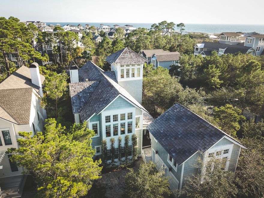 Masterful design and modern luxury are uniquely embodied in this beautiful home in The Watersound Beach. Designed by Geoff Chick & Associates, every detail was carefully selected and quality crafted. The top-of-the-line chef's kitchen is clad with premium finishes and fixtures including custom cabinets & professional-grade appliances. Highlights include reclaimed pine flooring, Circa lighting, Shiplap throughout the home, a two car garage and tower with magnificent Gulf views! Sprawling entertaining spaces flow outside to the open-air terrace and carriage house, where the stunning hot Morracan pool awaits. Located on an oversized corner lot bordering a pond and mere feet from the dune walkovers, this striking home is the crme de la crme in the prestigious community of Watersound Beach. Enjoy the untouched splendor of the coastal dunes, Camp Creek Lake & mile of beachfront. Don't miss the special opportunity!

