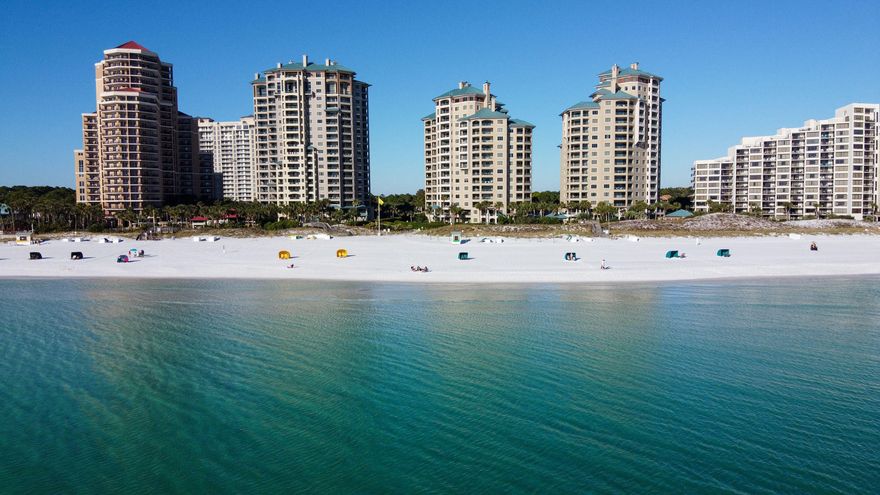 This 17th floor condo is spectacular! Fully updated coastal dcor makes this private deeded beach front home beautiful. Entire open living area, 3 full bedrooms (4th bunk room) and 3 full baths on the Gulf. Premium Bosch appliances, custom kitchen and fireplace. Fully furnished and turnkey ready.