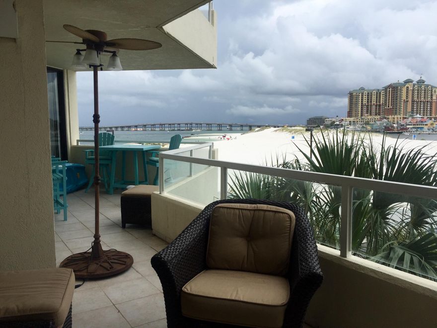 Destin's premier Condo location in the Highly sought after East Pass Towers! AMAZING VIEWS of the Beach, the Pass and the Destin Harbor from this REMODELED 2 bedroom (BOTH overlooking the water) 2 full bath unit with designer kitchen and wrap around balcony that provides a front row seat for the Evening Sunsets and the Destin Firework display! This gated secured tower offers the best of both worlds... you are permitted to rent the unit if you want to generate investment income, however this unit has never been rented and has been meticulously maintained as a second home! The large open kitchen features granite countertops, custom cabinetry, glass tile, stainless steel appliances and a breakfast bar. The large Master bedroom has custom reclaimed wood feature wall, King Bed, large closet, desk area, sliding door leading to the balcony  and a master bath with custom tile shower, double vanity, and make up area. Bedroom 2 sleeps 4 with a Twin over Full custom Bunkbed with trundle and built in steps, sliding doors leading to the balcony, and the same great view as the master! There is a 2nd full bath, a laundry closet with washer/dryer, plenty of closet/storage space with shelving, and a tasteful coastal dÃ©cor helps bring paradise home! The beautiful towers have center atriums with multi level water features and expansive glass ceiling. Located on prestigious Holiday Isle in the PERFECT spot to experience the BEST of Destin! Units like this are rarely available. Act FAST before it's GONE!