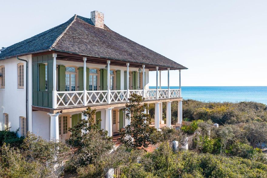Experience an unmatched lifestyle at 38 South Cartagena Lane, a stunning gulf-front residence in the heart of Rosemary Beach. This exquisite property, featuring a three-bedroom, three-and-one-half-bathroom main house and an elegant carriage house, offers a perfect blend of coastal charm and modern comfort for an unforgettable Rosemary Beach experience. The main house boasts breathtaking gulf views and convenient access to the beach. Every detail of this home has been curated for ultimate comfort and style. The interior features designer furnishings, luxurious finishes and a gourmet kitchen with top-of-the-line Wolf appliances. The spacious layout comfortably accommodates up to eight guests, with two elegant king bedrooms with ensuite bathrooms and a charming bunk room with two twin bunk sets, ideal for families or friends. Begin your mornings with spectacular sunrises and unwind in the evenings with mesmerizing sunsets. The expansive porches provide the perfect setting for relaxation and alfresco dining, allowing you to immerse yourself in the serene coastal ambiance. The prime location offers easy access to the shops and renowned restaurants of Rosemary Beach's town center, all just a short stroll away. Guests can enjoy the community swimming pool and activities like paddleboarding, fishing, biking and golfing. The property is located within close distance of both private and commercial air travel. The property also includes a newly refurbished carriage house  a cozy, West Indies-style retreat designed for additional convenience and accommodation. The carriage house offers a private entrance, a comfortable living area with plush seating, a fully equipped kitchen with modern appliances and a luxurious bathroom with a spacious walk-in shower. The sleeping loft features a king-sized bed with ample storage. Step onto the veranda to enjoy stunning gulf views, making it ideal for morning coffee or evening relaxation. The carriage house perfectly complements the main residence, offering additional space and privacy for your group. Whether for a potential income-generating asset or extra accommodations for family and friends, the carriage house enhances the home's luxurious experience, ensuring a memorable stay in Rosemary Beach. Discover the epitome of coastal luxury in a cherished haven and the perfect destination for your future legacy retreat.