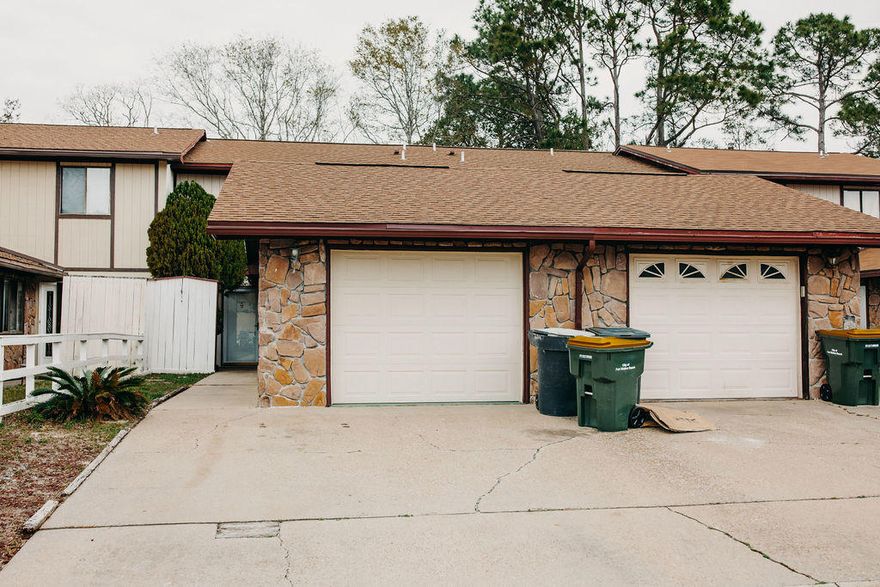 Here's your chance to own a 3 bedroom, 2 and a half bathroom condo east of Hurlburt field and close to everything! This gem is also directly across from the best park in the FWB area - so it's perfect for families, military people and anyone who needs a great place close to Navarre, FWB or Destin! Fresh paint in many rooms, new carpet down stairs, new stove and did we mention...an ATTACHED 1 car garage?? This opportunity is perfect for investors (7 year rental history available upon request) as well as anyone searching for a great value that is also perfectly located! Yes - this one is a must see! It won't last long!