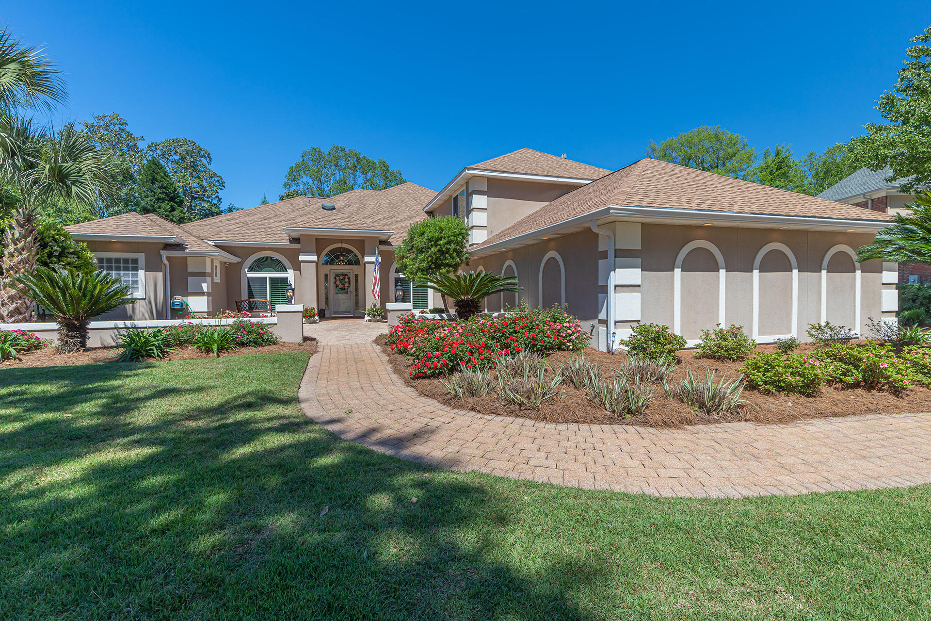 Look no further! This rare EXECUTIVE 6bed/6bath/4 car garage home has finally arrived! This 'one of a kind' custom built beauty sits on the LARGEST lot in private and well known subdivision 'Glenlake' of Bluewater Bay. The possibilities of creating your custom space catered to your needs are endless! This home features a desirable split floor plan with a huge first floor master suite with tray ceilings, sitting area and a gorgeous newly remodeled bath with sliding barnyard closet doors, custom shelving, garden tub, dual vanities, large walk- in rain shower! Get ready to entertain your family and friends in the enormous gourmet dream kitchen with SS appliances, granite counters and cabinets galore! The kitchen also features a large snack bar, wet bar, wet coffee bar, center island, breakfast nook with bay windows, wine cooler and a pot filler! Whether you're relaxing in the living or sunroom you can be sure to enjoy the stunning views of the pool and spa in the enclosed lanai! You and your guests will appreciate all of the natural light and the majestic nature views of the golf course. The roof, both HVAC's, Water heater and pool pump were all replaced in 2016 and 90% of the windows have been recently replaced with hurricane resistant windows. With its prime location near top rated schools, a 10 minute drive to the beach and Eglin AFB this home truly offers it all!