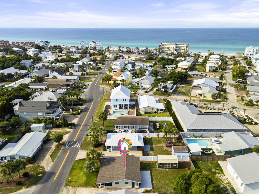 UNDER CONTRACT - SELLER ACCEPTING BACKUP OFFERS!Welcome to your new beach retreat, just 200 feet from the shimmering waters of the Gulf of Mexico. This exquisitely renovated 3-bedroom, 2-bathroom beach house epitomizes coastal luxury and sophisticated living. Meticulously updated in 2021, this residence offers 1,000 square feet of modern elegance blended seamlessly with timeless beachside charm. enjoy relaxing evenings on the expansive, screened in, covered porch. As you step inside, you'll be greeted by an open-concept living space adorned with charming finishes and fixtures, including the kitchen which features open shelving, new appliances, custom cabinetry, and quartz countertops, perfect for entertaining or enjoying a quiet evening at home. This beach cottage has three full bedrooms