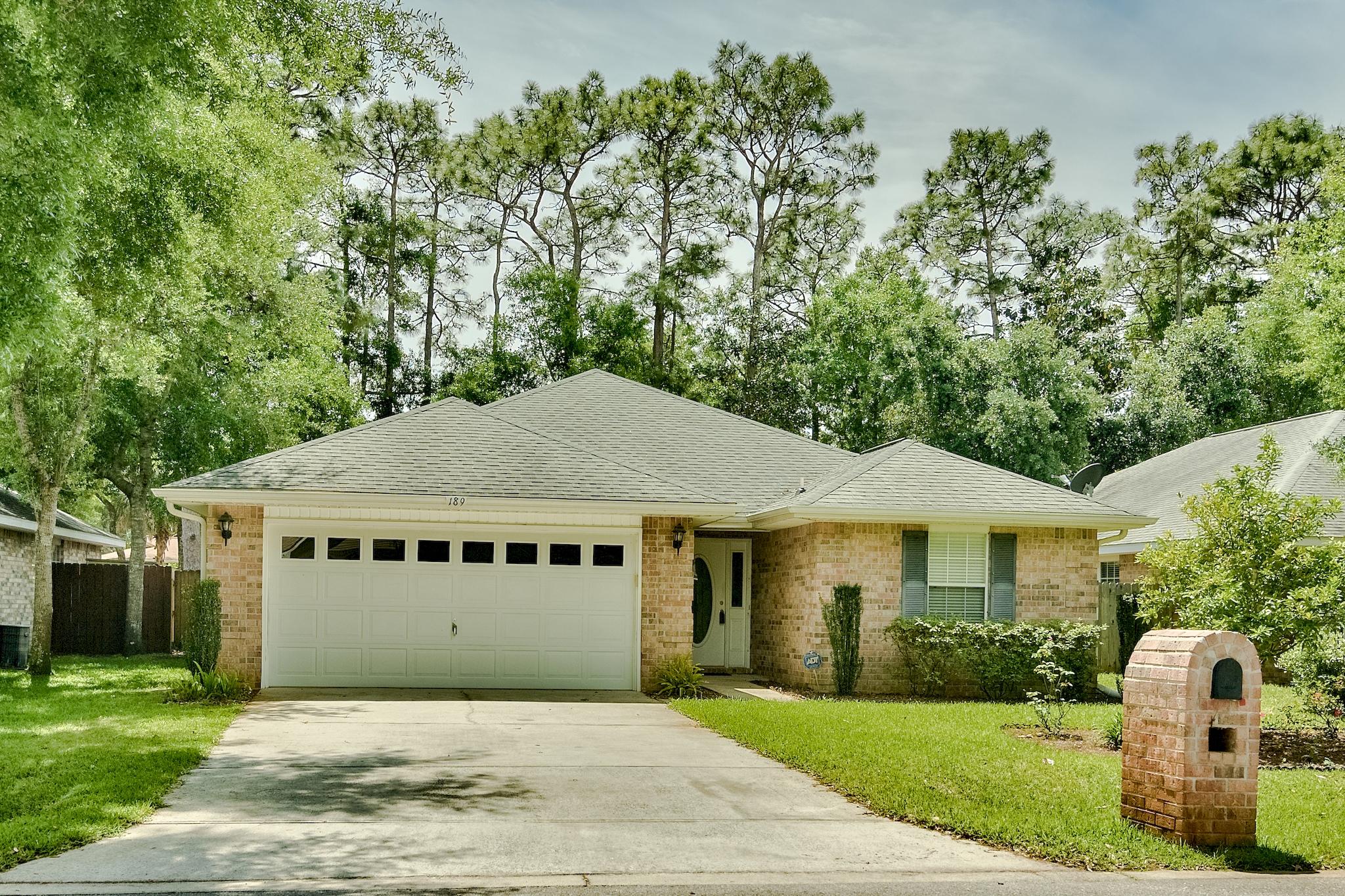 Fantastic 3BR/2BA brick home perfectly located in the charming community of Bayou Landing, just off Mack Bayou. This lovely home boasts 1,548 sq ft & features an open floorplan & vaulted ceilings. The open living/dining area is spacious & perfect for entertaining. Beautiful vinyl wood flooring extends throughout the common areas with tile floors in both bathrooms. The kitchen features a large breakfast bar, great for casual dining. This home features a split bedroom floor plan with generously sized rooms, all with new carpet installed. The master bedroom features an en-suite bathroom with a double vanity & walk-in closet. The fenced-in back yard features an open patio & plenty of green space to enjoy outdoor activities. Enjoy grilling, outdoor dining, watching the kids play, or add a pool!