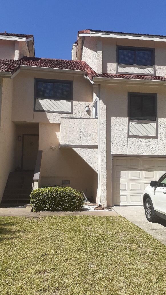 Beautiful updated townhome on the water.Walk to Marina, Pool and restaurants.Amazing sunsets over the water. 3 bedrooms, one with a finish loft area with closet for teen space or office.Kitchen is updated and opens to finish sun room with great views of pure beauty. Great room with wood burning fireplace and cathedral ceiling.Wonderful place for all to have private space and enjoy the natural surroundings of beauty on the bay.