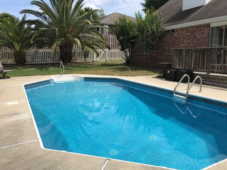 Spring into summer! Large 4Bd/3Ba family home with a POOL, on a 1/3 acre lot located in a quiet neighborhood, with rolling hills. And did I mention the pool? BRAND NEW ROOF to be installed soon! Spacious floor plan, with lots of natural light from above, the open foyer welcomes you in - dining room to the left, comfortable sitting/living room to the right. Enjoy the great room with high ceilings and corner fireplace. The eat-in kitchen includes extras like a pantry, hard surface countertops, and updated fixtures. 2 bedrooms downstairs, including the master. 2 bedrooms upstairs, along with a spacious loft overlooking the great room. Enjoy the outdoors: Resort living with the elevated deck overlooking the sparkling pool or country living with the box garden and chicken coop.