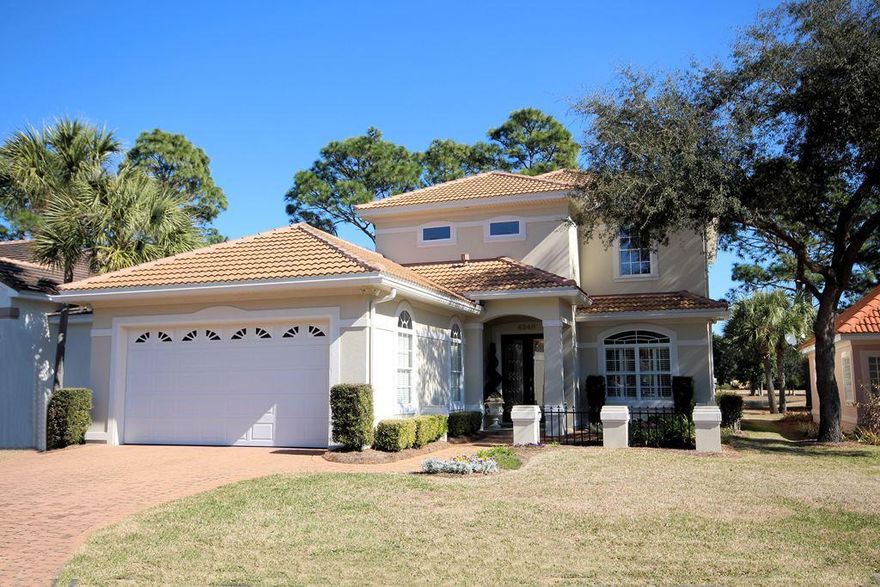 Award winning 2006 Parade home custom built by J.P.Hayes in the private waterfront community of Sunset Beach in Bluewater Bay. Located within the gated community of Southwind, Sunset Beach offers its residents a private clubhouse with a resort style pool and a sandy beach located on picturesque Choctawhatchee Bay. Relax and enjoy life to its fullest in Sunset Beach because all of the yard work is done for you! This exquisite golfcourse home overlooking a serene lake will exceed your expectations. The home boasts 2 master suites, one downstairs and one upstairs, both with their own large, private baths. The open floorplan downstairs includes a formal dining room, an amazing kitchen and breakfast room, the downstairs master bedroom and an office that can also be used as an additional bedroom