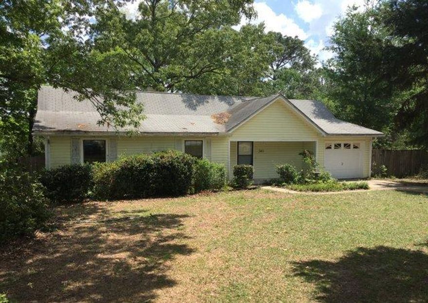 REO ~ Lots of Potential in this 3 bedroom, 2 bath home on Kings Lake. The home is situated on two lots with There is a living room with fireplace, an eat-in kitchen & formal dining room. There is a screened porch as well as Florida room that adds for extra space. Don't miss out on this great opportunity!