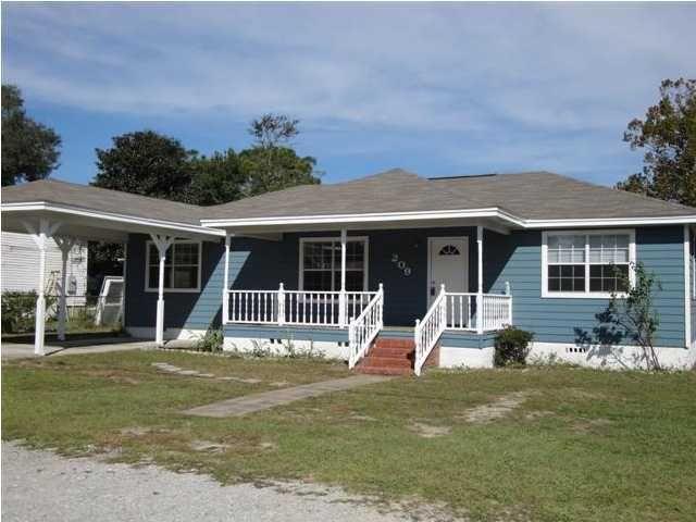 Check out this charming cottage in the heart of Niceville! A shirt distance from a neighborhood playground, middle school, shopping, churches, the Niceville library, children's park and the senior center. This three-bedroom home features two living rooms, a dining room, wet bar and a screen in porch and a detached single car garage. Large fenced yard with double gates on each side. Covered carport and extra street parking. Boasting wood, laminate and tile floors throughout, no carpet.