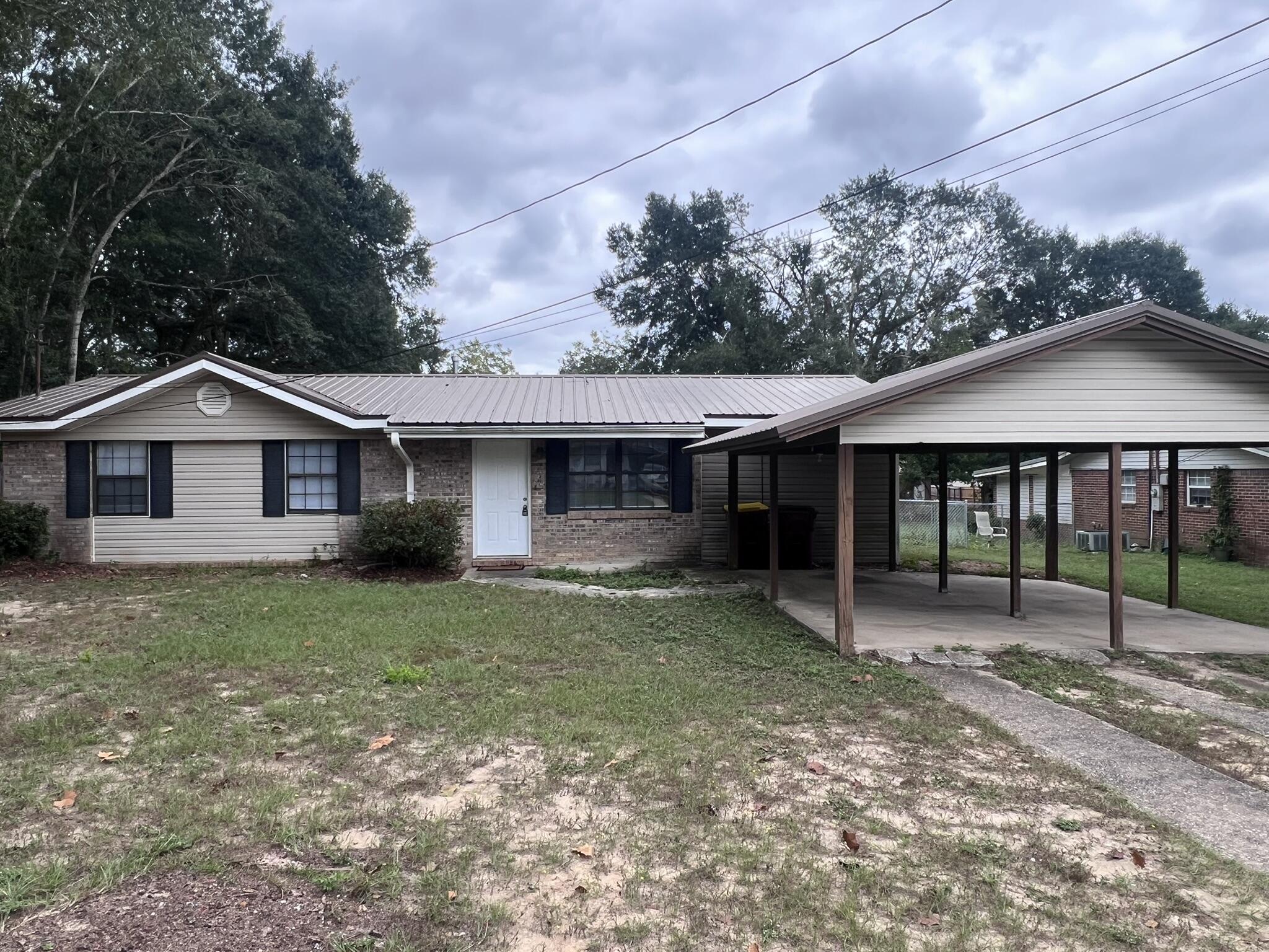 THIS SPACIOUS HOME HAS 3 BEDROOMS, 2 FULL BATHS, INSIDE LAUNDRY ROOM. 2 BONUS ROOMS, VERY LARGE KITCHEN WITH LOTS OF CABINETS. THE HOME IS SITUATED ON A FLAT LOT WITH LARGE PRIVACY FENCED BACK YARD, YARD BUILDING, 2 CAR CARPORT AND SMALL BACK COVERED PORCH. ONE SMALL PET IS OKAY WITH PET FEE AND APPROVAL BUT NO SMOKING IN THE HOME PLEASE.