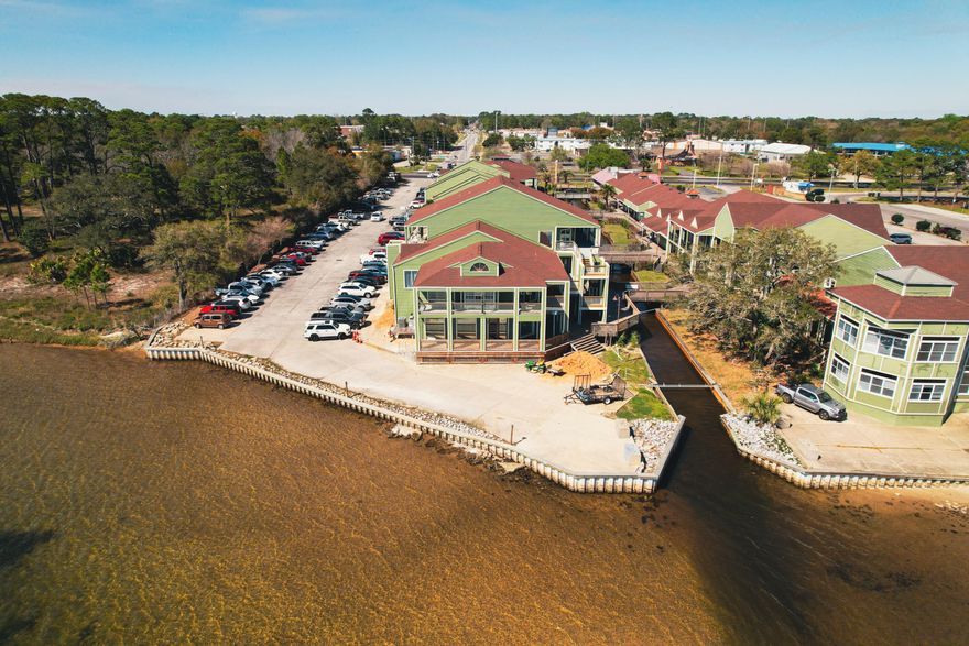 Introducing a newly listed 2,850 SF office space located in Paradise Village Professional Park, Fort Walton Beach. Situated on the south end of the complex, this second-floor office provides breathtaking views of the Santa Rosa Sound. The layout features 8 offices, spacious meeting areas (both open and private), a break room, two restrooms, and generous balcony space. The complex, which fronts Hwy 98, hosts a diverse tenant mix, including healthcare, financial, real estate, spa, and defense services. On-site amenities include ample parking and a picturesque canal with communal sitting areas, perfect for enjoying some fresh air and shade. Conveniently located just 5 miles from Hurlburt Field, 9 miles from Eglin AFB, and 11 miles from Destin-Fort Walton Beach (VPS).