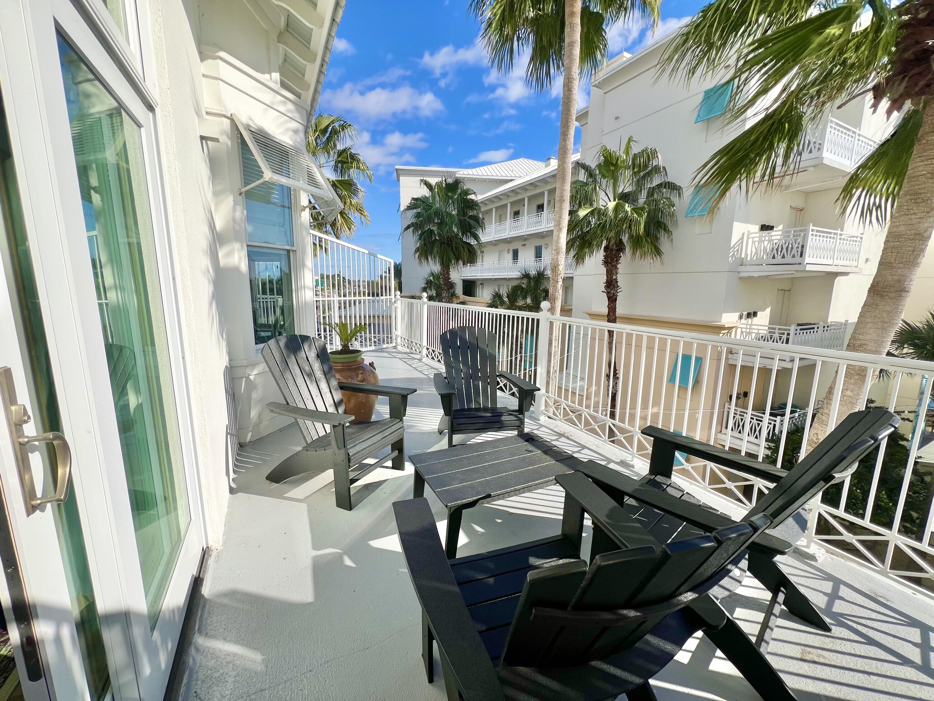 This well designed, beautifully decorated, immaculate one bedroom condo in the Downtown area of Carillon Beach will not last! There is an open living and dining room floor plan with easy access to the kitchen, a half bath and a spacious balcony with views of Lake Carillon that make up the first floor. On the second floor, you will find a huge master bedroom and master bathroom with lake and gulf views! Enjoy all of the amenities that Carillon Beach has to offer! There are three community pools, one which is gulf front, tennis, pickleball and basketball courts, a children's play area, green spaces galore and nearly a mile of pristine beach!