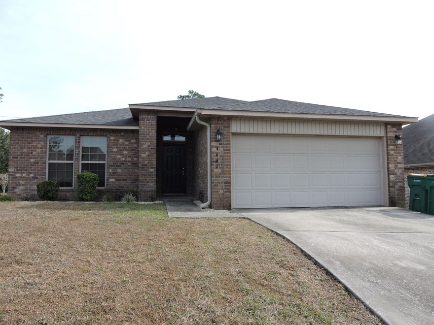 SOUTH OF I-10 & CLOSE TO ALL BASES!! 3br/2b, 1615 SF all brick home on a corner lot!! Open floorplan, with kitchen overlooking the family room as well as dining & sun room! Kitchen features breakfast bar, granite countertops, composite sink, plenty of counter space & cabinets, gooseneck faucet, pantry and stainless steel appliances. Laundry just off the kitchen. Ceramic tile in foyer, kitchen, laundry & baths. Large master bedroom, and master bath with separate shower, garden tub, double vanity and oversized walk-in closet. Enter the sunroom from the master bedroom or the dining area to go the privacy-fenced back yard.