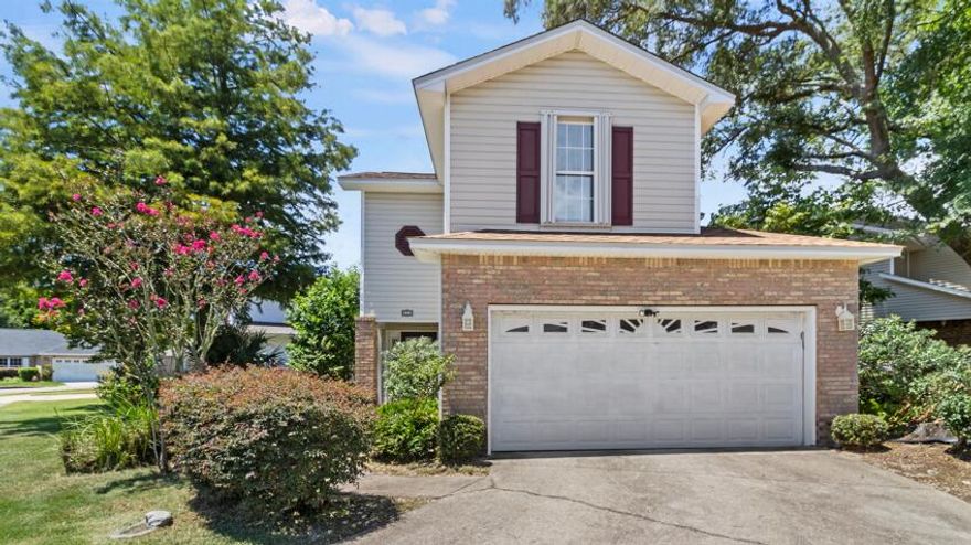 $10,000 in closing costs or rate buy down with acceptable offer!Step inside to find NO carpet--ceramic tile downstairs and new luxury vinyl plank flooring upstairs. The living room features a cozy gas fireplace, and lots of natural light.The kitchen features stainless steel appliances, ample cabinet and counter space including a breakfast bar.The upstairs laundry room adds everyday ease. Enjoy peace of mind with a new roof (2025), water heater (2024), and hurricane shutters (2017) already in place.