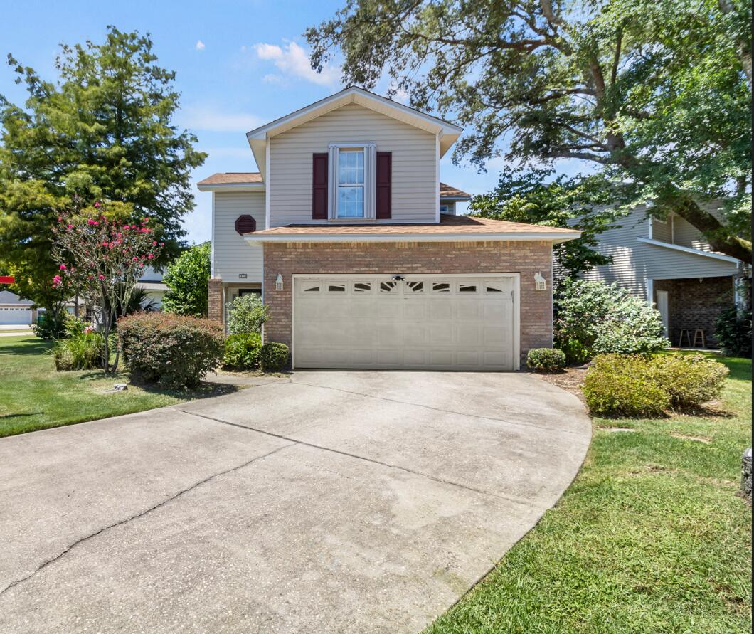 Welcome to this beautifully maintained home centrally located in Fort Walton Beach. Tucked away in a quiet planned subdivision by Whitrock Builders, this property offers the perfect blend of comfort, style, and convenience.Step inside to find NO carpet--ceramic tile downstairs and new luxury vinyl plank flooring upstairs. The living room features a cozy gas fireplace, and lots of natural light.The kitchen features stainless steel appliances, ample cabinet and counter space including a breakfast bar.The upstairs laundry room adds everyday ease. Enjoy peace of mind with a new roof (2025), water heater (2024), and hurricane shutters (2017) already in place.Outside, the charming backyard garden and covered porch offer a private oasis.