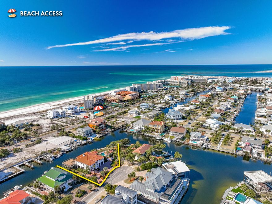 TURNKEY! FULLY FURNISHED! 217' of navigable deep-water on the exclusive Holiday Isle of Destin, Florida, offering the best of both interests, dedicated beach access and boating.  This sprawling estate was designed to beautifully entertain you and your guests while enjoying the ambiance projected from its rare waterfront expanse, and in proximity to the scenic harbor and its array of waterfront restaurants & commercial amenities, East Pass, Crab Island, Choctawhatchee Bay and the Gulf of Mexico.  The superior orientation of its magnificent, nearly half acre cul-de-sac lot enjoys a radius engulfing approximately 217' along its deep-water canal, also containing inset boat slips and a sundeck... The home enjoys views of the gorgeous Caribbean-like, Emerald Green water of the Gulf of Mexico.  The stunning waterfront pool deck, pool cabana, and summer kitchen will offer you, your family, and guests' unforgettable memories. The existing survey, floorplan, and upgrade & exclusion list are located under the Documents Tab. Fully furnished, some exclusions shall apply. Please inquire for further details and to schedule your private showing. The VRBO Listing is contained in the following link https://www.vrbo.com/3578999