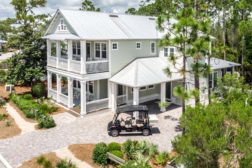 Welcome to the quieter side of Watercolor! This beautifully decorated home in Phase 4 of Watercolor checks all the boxes for resort living. From its inviting front porch to its 3271 square feet, the home provides an abundance of living and entertainment space for family and guests. Located downstairs is a Jr master suite, separate office space, open kitchen and living area, with a separate dining area. The screened porch overlooks a very inviting heated pool and a private wooded back yard. Upstairs is a large master suite, 2 additional bedrooms, each with its own bath, a sitting area, plus a 4 bed bunk room. Luxury, quality, and privacy in an amazing home, don't miss this opportunity. Call today to tour this beautiful, spacious home!!