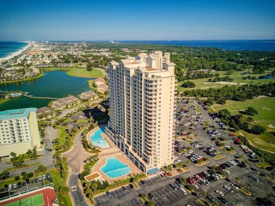 Enjoy breathtaking views of the Gulf of Mexico and the picturesque community of Seascape from your private balcony. This luxury Ariel Dunes condo has been well cared for and recently updated. Features include granite countertops in the fully equipped kitchen, 9ft ceilings, a large master bath with soaking tub, dual-vanity and separate shower, and a laundry room w/ full-size stackable washer/dryer. Ariel Dunes is located inside Seascape Golf & Beach Resort which grants access to all the amenities. The resort has 18-holesof golf, multiple pools, tennis courts, Pickleball, a fitness center, and restaurants all just steps away from private deeded access to 2000' of pristine beach!  Unit is being sold turn-key, rental ready. Come see it today!
