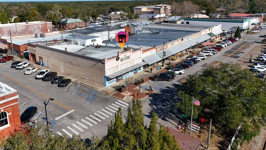 A standout corner building in the heart of downtown DeFuniak Springs, FL a Main Street USA city. The 4,550 SF building sits at the corner of Baldwin Avenue and 8th St. and benefits from strong foot traffic, easy access, public parking all around and a commanding presence right in the downtown core. This is a natural fit for restaurant, retail, or a mixed-use concept. Downtown DFS is in a period of real, measurable growth, driven by local ownership, thoughtful revitalization and a community that shows up for the businesses it loves. If you've been waiting for the right place to bring a concept to life or secure a meaningful downtown investment, this is it. Value is in the structure and location. This is a true redevelopment opportunity. The bones are solid, but the building will require significant renovation. You're essentially buying the four walls, the footprint, and the corner it sits on, making it a clean slate for a full reimagining. This is your invitation to be a part of our growth - and to build something that matters. 