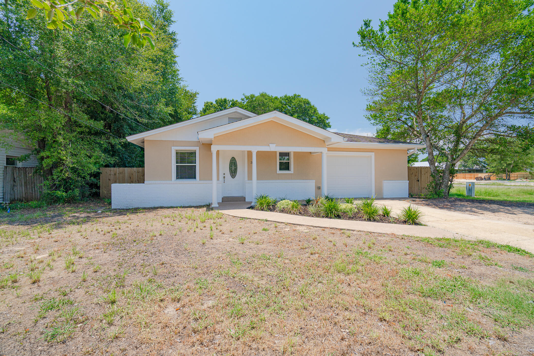 This charming Florida Cottage is 5 minutes from Eglin Air Force Base gate and sits on a large fenced corner lot offering privacy and a large covered deck in the backyard for BBQ's. This is a completely renovated one level home, with 3 bedrooms and 2.5 half baths, it has tile and laminate flooring throughout and is freshly painted. The master suite has a beautiful en suite with a double vanity and huge walk in closet. 15 minutes to the white sand beaches on the Emerald Coast. Call for an appointment.