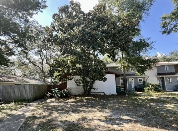 This HUD REO presents a great opportunity live in the heart of Destin and not break the bank. This 2 bed 2 full bath single story Townhouse was built in 1984, and is an end unit with a large yard that is not typical for most Townhomes. Home has tiled floors, vaulted ceilings, and tiled showers. Much of the unit was updated at some time in the past and with just a little bit of work can shine. A definite must see if looking to be in the heart of Destin. This home is FHA insurable with escrow (IE).