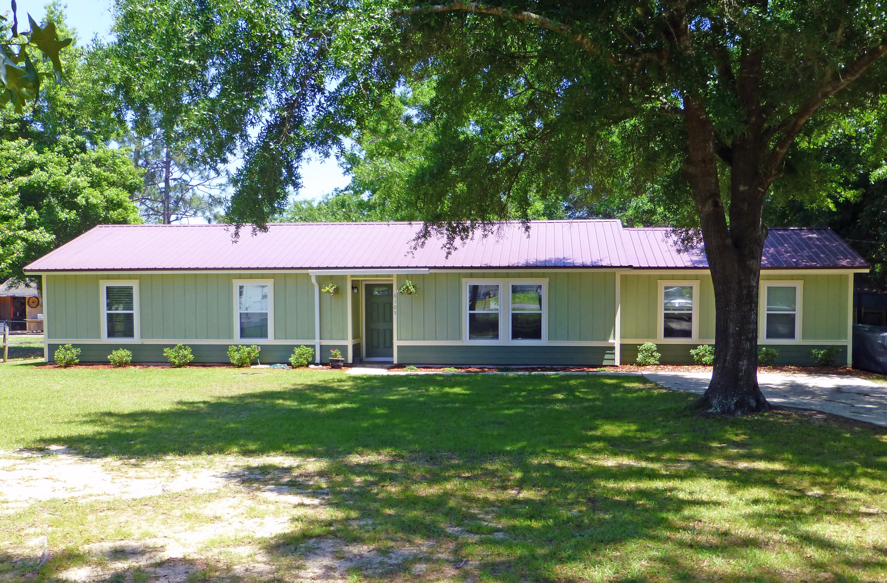 Better than new! This home has been completely remodeled and is move-in ready. The current owner altered the floor plan to give the home 4 bedrooms and 2 baths. There is also space for another full bathroom if you have the need. The outside of the home has a mix of wood and cement fiber board that has been painted in a beautiful green color scheme. As you enter into the home you notice the large living room that is open to the dining room and kitchen making this a great home for entertaining. Speaking of the kitchen, there is an abundance of cabinetry and counter tops giving the chef in the family space to work comfortably. The seller has made several updates worth mentioning: A/C (inside and outside units), duct work, water heater, lighting fixtures, and doors.
