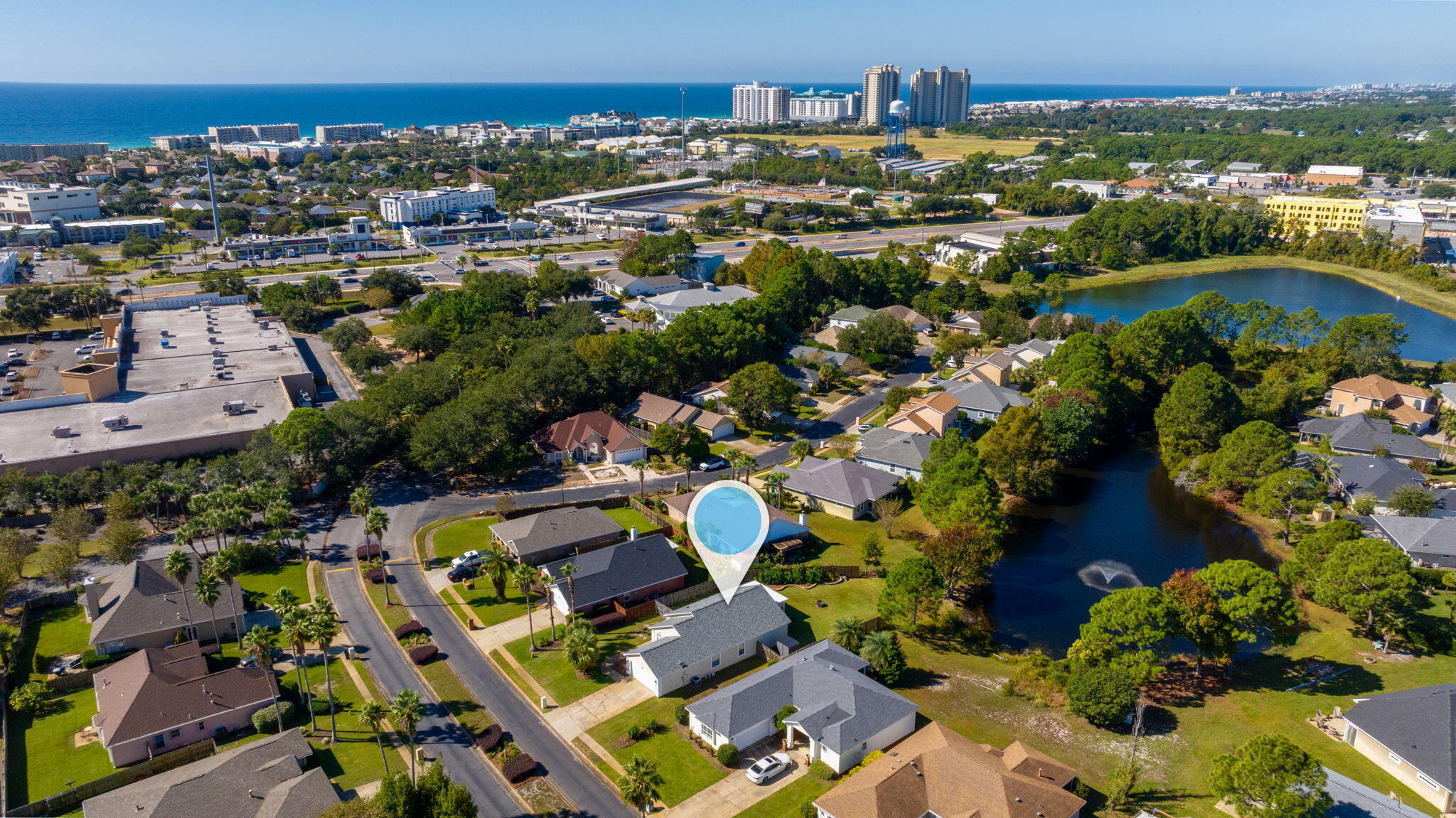 This lakefront home in the charming Bayside community of Miramar Beach is a RARE find! 171 S Shore offers a unique opportunity to embrace the Emerald Coast lifestyle while enjoying the tranquility and beauty of lakeside living; 1 of 20 homes w/exclusive access to backyard fishing. Rather catch some redfish in Choctaw Bay? It's as easy as a short stroll down the sidewalk lined streets to the private community pier. This meticulously maintained home boasts many desirable features: carpet free, newly remodeled kitchen to include gas range/soft close cabinetry/quartz countertops, 12x20 enclosed lanai overlooking the manicured backyard (please see ''Update Sheets'' for full list of improvements). This home is turn-key. 1 mile to white sand beaches of the Emerald Coast,mins to shopping!