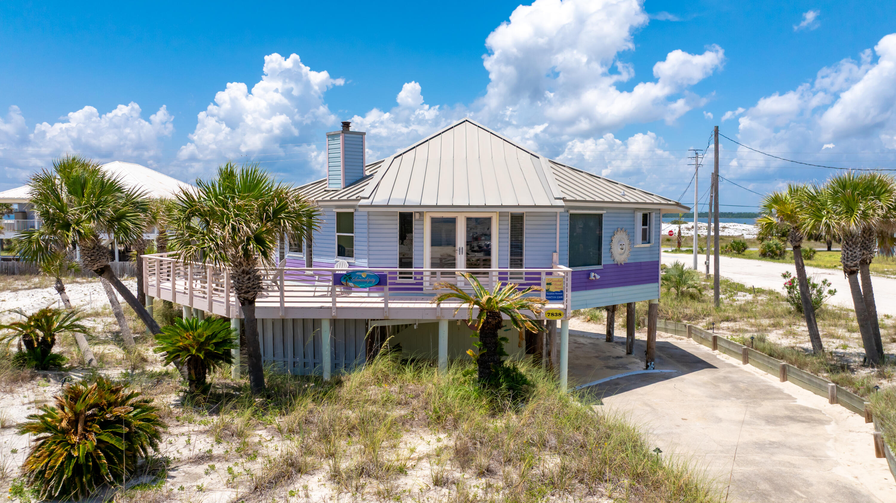 Welcome to ''Serendipity'' a charming and unique beach home just a short walk from the emerald waters and sugar-white sands of Navarre Beach. This octagon-shaped coastal retreat offers views of both the Gulf and Sound, making every sunrise and sunset extra special. Step outside onto the wrap-around deck ideal for morning coffee, soaking up the sun, or evening cocktails with friends and family. Inside, find a bright and inviting living space, 3 bedrooms and 2 baths, accommodating 6-8 guests.The home is being sold fully furnished, so it's completely turnkey ready for immediate enjoyment or rental income. The open floor plan blends living, dining, and kitchen areas seamlessly, while the fully equipped kitchen makes preparing meals a breeze. Each bedroom offers privacy and comfort... creating a relaxing escape for owners and guests alike. Serendipity has a strong short-term rental history, averaging approximately $60,000 per year offering excellent income potential for investors or those who want to offset ownership costs. A brand new HVAC system installed in 2025 ensures year-round comfort with peace of mind. Whether you're searching for a personal vacation retreat, a full-time residence, or a proven investment property, Serendipity offers it all in a laid-back, friendly beach community. Navarre Beach is known for its pristine shoreline, outdoor recreation, and small-town charm, the perfect backdrop for your coastal lifestyle. Call for an appointment to view!