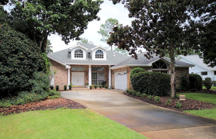 Great find !! One owner brick 4 bedroom 3 bath home in Bluewater Bay.  J P Hayes design. This home when built includes many builder upgrades including raised smooth ceilings, large designer kitchen, limestone flooring, recessed Lighting and oversized, tray ceiling in master and formal living area. Split floor plan  with the kitchen in the center of the home, great for entertaining. Family room is large with lake views and a gas fireplace for those cool evenings. Kitchen with center island ,corian counter tops. Master Bedroom also has lake views,  Master bath is large and includes walk-in closet and shower ,Jetted tub. Covered porch is screened and overlooks the rear patio and lake, The garage is huge with separate door for a golf cart. Bluewater offers golf, tennis, Boat storage and natur