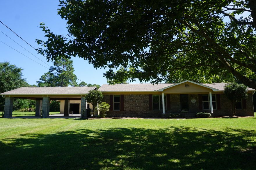 Great home for horse lovers! This single family home is situated on 2.02 acres and has 2 horse stalls located on the back side of the detached garage/shop. This home is move-in ready and has a beautiful yard with an irrigation well! Convenient to Beaches, Parks, Sports Complexes, Shopping Centers and NAS. Buyer to verify lot size and Sqft.