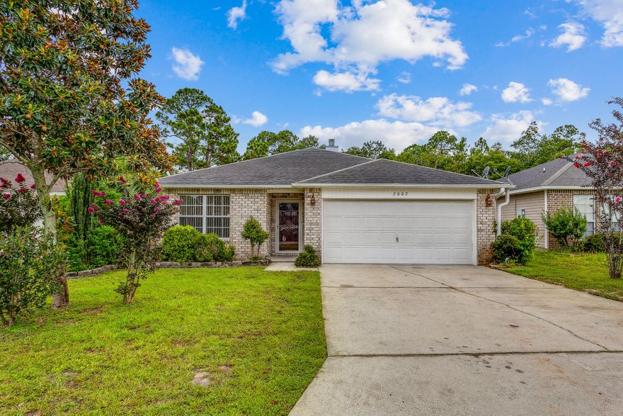 Looking for an open floor plan with a beautiful backyard? Look no further! Enjoy the peaceful sounds of the creek that runs along the back of the property from the enormous covered deck! There is also a completely tiled screened porch with vinyl windows. Backyard also offers two nectarine trees and two olive trees creating an outdoor area that is the perfect place for your new, relaxing sanctuary. Tile throughout the house and an upgraded kitchen with granite countertops, backsplash and window sills. Plenty of cabinet space if you spend a lot of time in the kitchen with a total of 22 cabinets and a kitchen island! This is an all brick home with hurricane protection and no HOA. The open floor plan with a breakfast bar makes this the perfect spot to entertain.