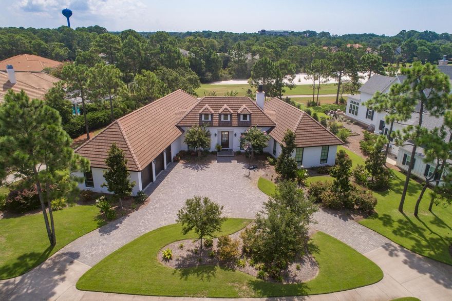 This custom built home is a MUST SEE in the beautiful gated community of Kelly Plantation! Home is located on the 11th hole and it is a stunner!The outside of the home is brick with a mortar wash(not painted), sits on .49 acres, has an in-ground sports pool with a sun deck, custom plantation shutters and window coverings, hurricane impact rated doors and windows, custom fire bowls at the swimming pool, built-in green egg, and is wired for audio/video on the back porch.The interior of the home boasts 10-13ft ceilings throughout, American Walnut floors, Subzero and Wolf appliances, tankless water heater, surround sound throughout, built-in coffee maker, Wolf range, double oven, and much much more!!!