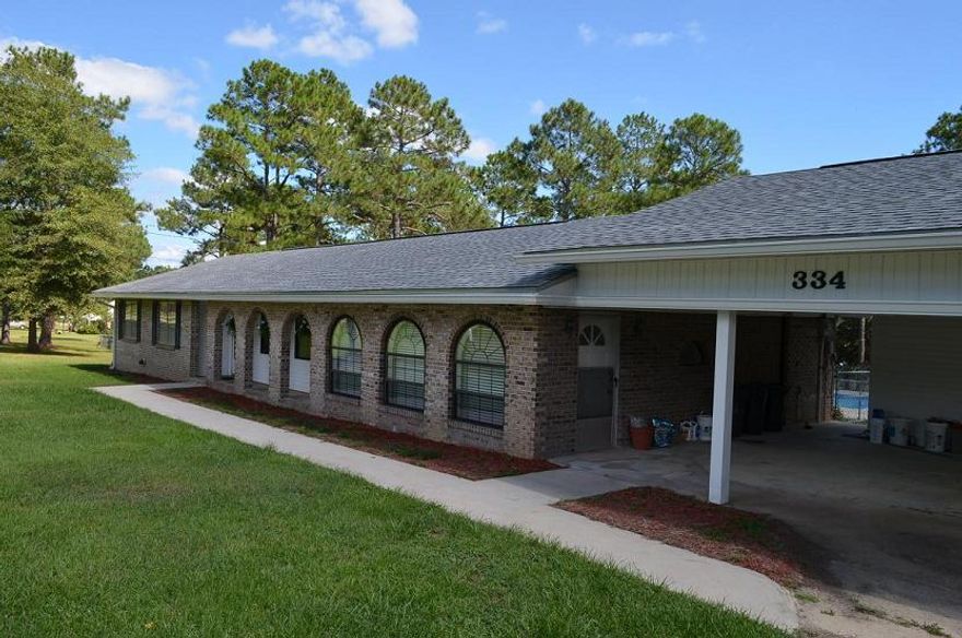 Motivated Seller says bring offer! Great lake front home with in-ground pool features 4 bedrooms and 3 baths with a fireplace is vacant and ready for immediate occupancy. 2,172 Sq Ft includes guest quarters with private entrance and kitchen facilities perfect for a mother-in-law suite. Over 2 acres with 150 feet of lake frontage and a dock! Buyer will pay $2,500 toward closing. Come check it out! All dimensions are approximate and should be verified to Buyer's satisfaction.