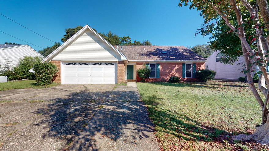 Great family home south of Interstate 10 with easy commute to Duke Field, Eglin and Pensacola.  When you walk into the great room you are greeted by a wood burning fireplace and cathedral ceilings with site lines to the back yard and screened in patio.  The downstairs bathrooms have been remodeled with granite counter tops, tile bath/shower enclosures and tile floors.  There are three rooms on the main floor with two more on the second floor.  At the top of the stairs is a loft area overlooking the great room that would make a great work, games, or reading area.  New roof 2019, No HVAC 2021. Don't miss out on this great home in sought after Southwest Crestview.
