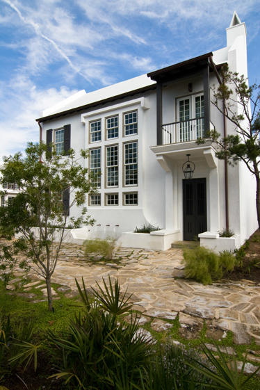 A highly desirable offering of a spacious, custom built Alys Beach Home featuring 4 bedrooms, 3.5 baths, and bunk room with a valued two car garage and added storage, fronting on Sea Garden Pedestrian Path at the foot of Lake Marilyn. Your arrival is enhanced by the dramatic entry with its 22-foot ceiling and custom designed stairwell ascending to the second floor, adding volume to the open floorplan. The home features a gracious kitchen open to dining and living area with fireplace and built in cabinetry perfect for entertaining or family. Relax in the spacious outdoor courtyard area with secret garden and loggia, including a fireplace and summer kitchen that can be closed for conditioned space. The home is being sold furnished subject to a specified list of exclusions.