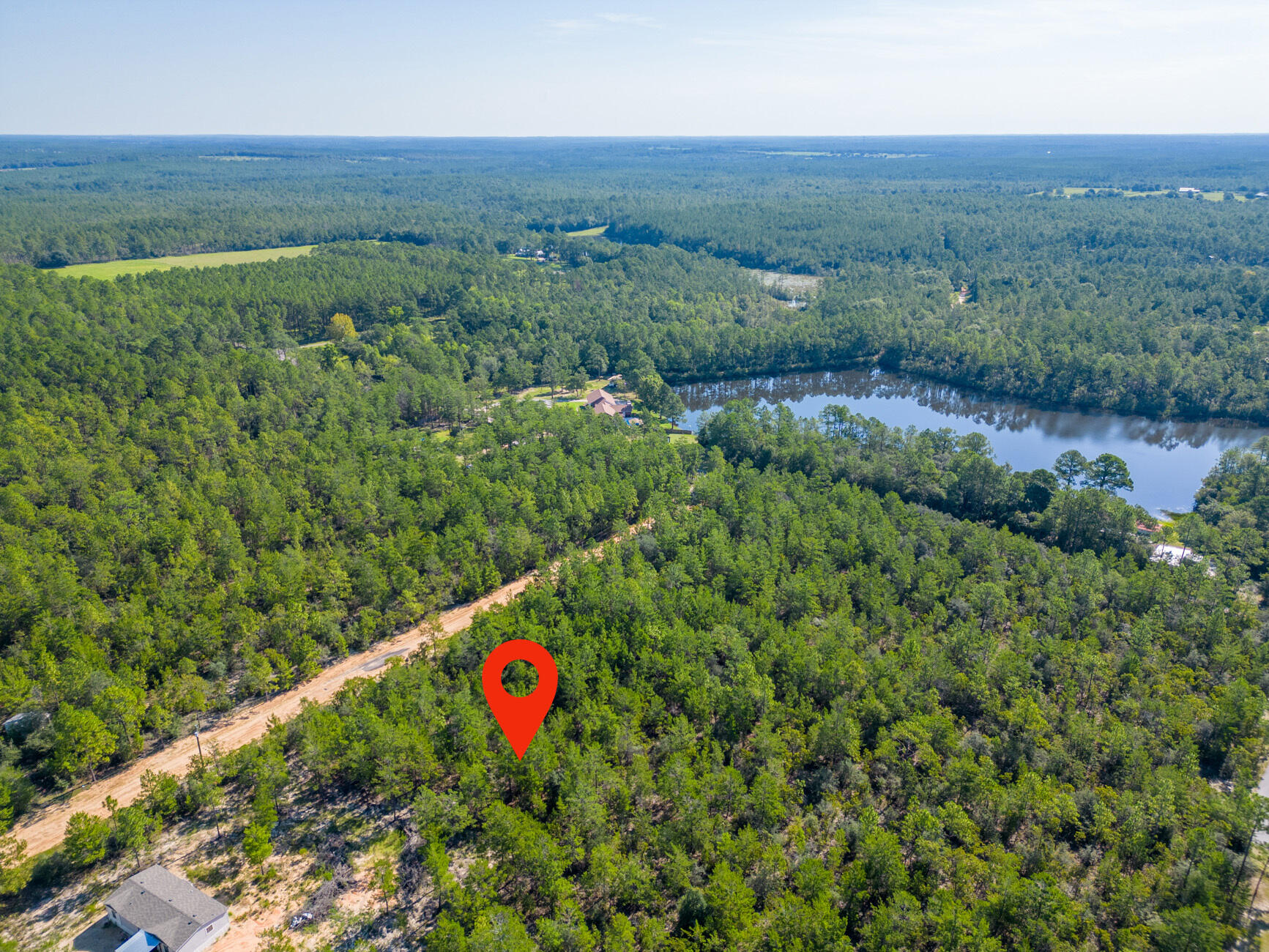 0.45 of an Acre Vacant Lot High and Dry, Non-Flood Zone. GREAT LOCATION! Mobile homes are allowed with No HOA Fees! This spacious lot offers convenient access to major highways (HWY 90, I-10, 285, and 331). HWY 90 is just under 2 miles away, and the DG Market Store is less than 4 miles away. Located approximately 12 miles from essential amenities like hardware and grocery stores, schools, downtown, and the historic Lake DeFuniak, this lot offers both convenience and tranquility.