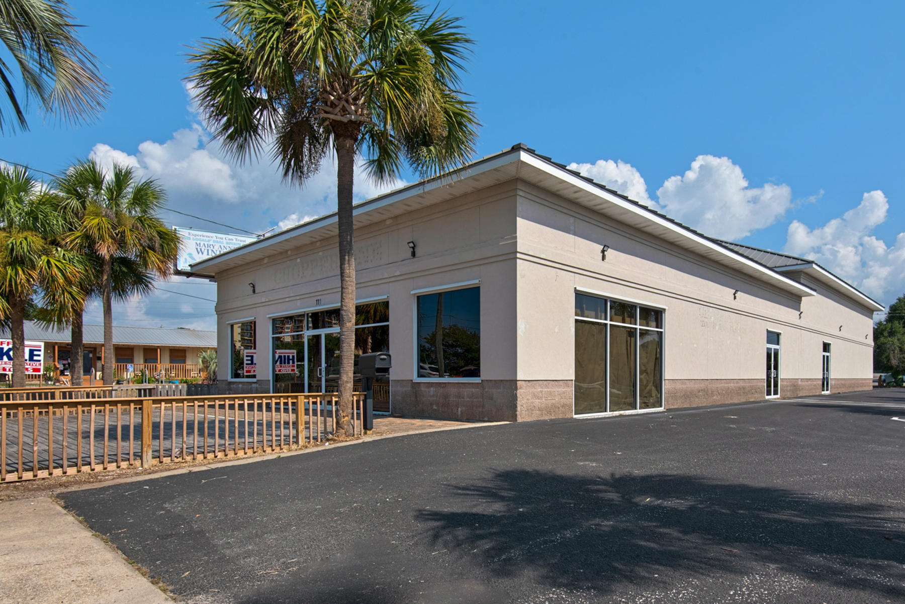 Premier Retail Opportunity! Recently had over $200K in inside improvements. Zoned as ''North Harbor Mixed Use'' which offers business options galore. Located across from AJ's/ Harbor Walk, and Emerald Grande. 81 frontage feet on Hwy 98 (Harbor Blvd) with traffic counts in excess of 54,000. Entrance access from the East and West sides of Hwy 98. Building contains 6,850 sq ft, approx 4,605 sq ft heated and cooled. Rear garage enters into 2245 sq ft Warehouse. Extra features include Slatwall Panels, 8,615 sq ft of recently resurfaced asphalt & heavily lit parking lot. Almost 1000 ft deck on front entrance. Built like a fortress, concrete block with hard coat stucco. Corrugated metal ceiling. Commercial metal roof. NEW A/C's, Security System & Hurricane Shutters.