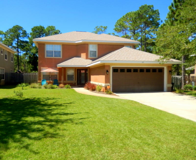 Large, 5 BR/3 bath home with lots of living space, a beautiful, updated interior & large private backyard! Backing up to protected natural woodlands, this home offers serene views & a peaceful cul-de-sac location on a very quiet street. It's two story foyer makes an immediate impact upon arrival. Beautiful wood floors in its 2 large living areas provide a great contrast to the lighter tile in the kitchen, baths and hallways. Home's large kitchen w/dark cabinets, glass back splash, SS appliances & large eating bar adjoins the great room & is the center of attention. 2nd large living room, located just off the kitchen, provides plenty of living & entertaining space for a growing or large family. The 5th bedroom on the main level would make a great office, play roo