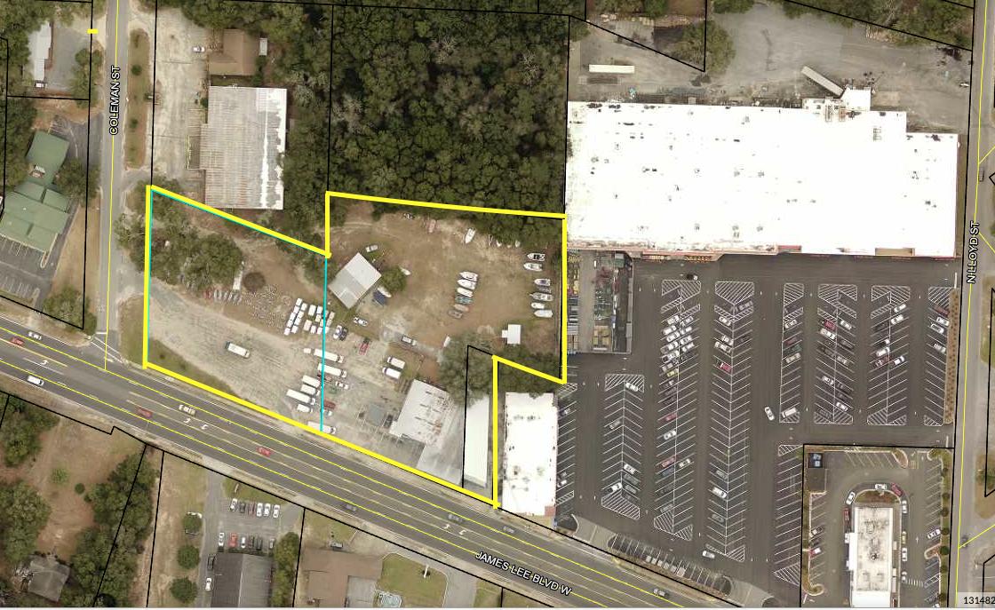 Prime for development or holding. Corner lot for perfect ingress and egress! Corner of Hwy 90 W (James Lee Blvd W) and Current tenants bring in $51,000 per year! On just the areas being utilized. There is still a lot of open space to develop on the flat 2.75 acre property! Location key to great traffic exposure! Just blocks away from entrance to historic town and the busy intersection of Hwy 85 and Hwy 90! Tractor supply located next door! Hurry this is a chance to get that diamond in the rough