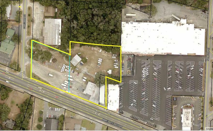 Prime for development or holding. Corner lot for perfect ingress and egress! Corner of Hwy 90 W (James Lee Blvd W) and  Current tenants bring in $51,000 per year! On just the areas being utilized. There is still a lot of open space to develop on the flat 2.75 acre property! Location key to great traffic exposure! Just blocks away from entrance to historic town and the busy intersection of Hwy 85 and Hwy 90! Tractor supply located next door! Hurry this is a chance to get that diamond in the rough