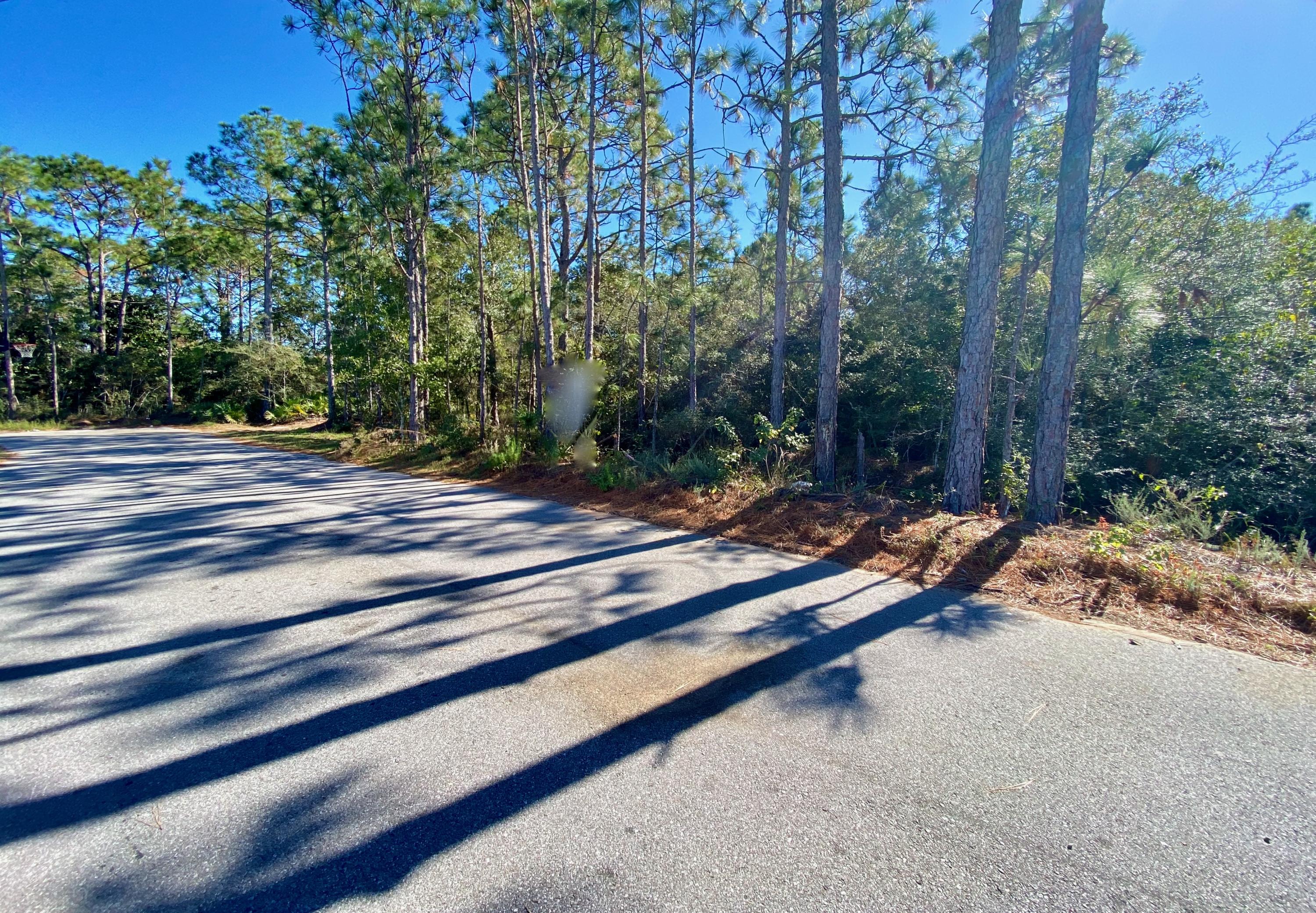Great lot measuring almost a full acre in Gulf Breeze. Zoned residential mixed use, this lot gives you a few build options. The lot does have wetlands and therefore priced accordingly.