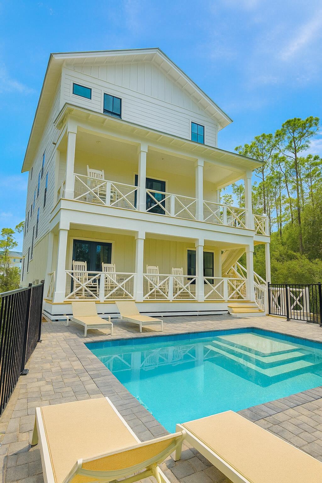 Brand new - 5 bedroom, 5.5 bath house in gated Treetops neighborhood adjacent to Seacrest with excellent rental projections ($150,000+) and deeded beach access just half a mile away. (Free golf cart beach shuttle picks up 50 yards from house) Enjoy a coastal chic, open concept design perfect for entertaining. The main floor (second floor) includes the living room, dining room, kitchen and laundry room. The first floor includes a two-car garage, entry way and two guest suites with private bathrooms. The third floor includes the spacious master suite with a luxurious master bathroom and a huge closet. The third floor also hosts two additional guest suites with private bathrooms. Treetops offers direct access to both 30A and Hwy 98 with easy access to Rosemary, Seacrest and Alys Beach.