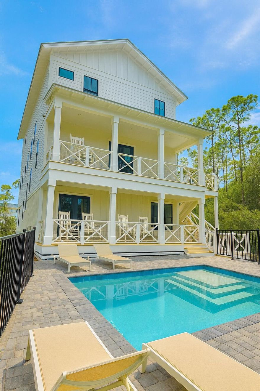 Brand new - 5 bedroom, 5.5 bath house in gated Treetops neighborhood adjacent to Seacrest with excellent rental projections ($150,000+) and deeded beach access just half a mile away. (Free golf cart beach shuttle picks up 50 yards from house) Enjoy a coastal chic, open concept design perfect for entertaining. The main floor (second floor) includes the living room, dining room, kitchen and laundry room. The first floor includes a two-car garage, entry way and two guest suites with private bathrooms. The third floor includes the spacious master suite with a luxurious master bathroom and a huge closet. The third floor also hosts two additional guest suites with private bathrooms. Treetops offers direct access to both 30A and Hwy 98 with easy access to Rosemary, Seacrest and Alys Beach.