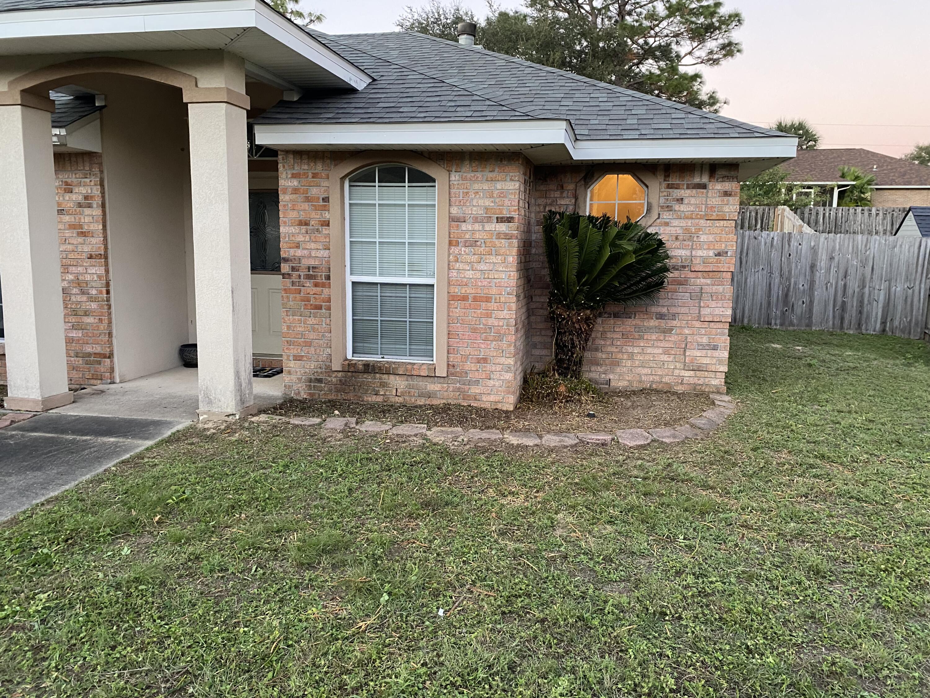 Welcome to this lovely brick home.  Located on a corner lot on the south side of Crestview.  This 3 bedroom, 2 bath, home includes a nice corner fireplace making the cold evenings cozy.  This home has a formal dining room and a roomy breakfast room.  There is a covered patio off the great room which is a wonderful bonus providing you with an outdoor  entertaining area or for simply relaxing.