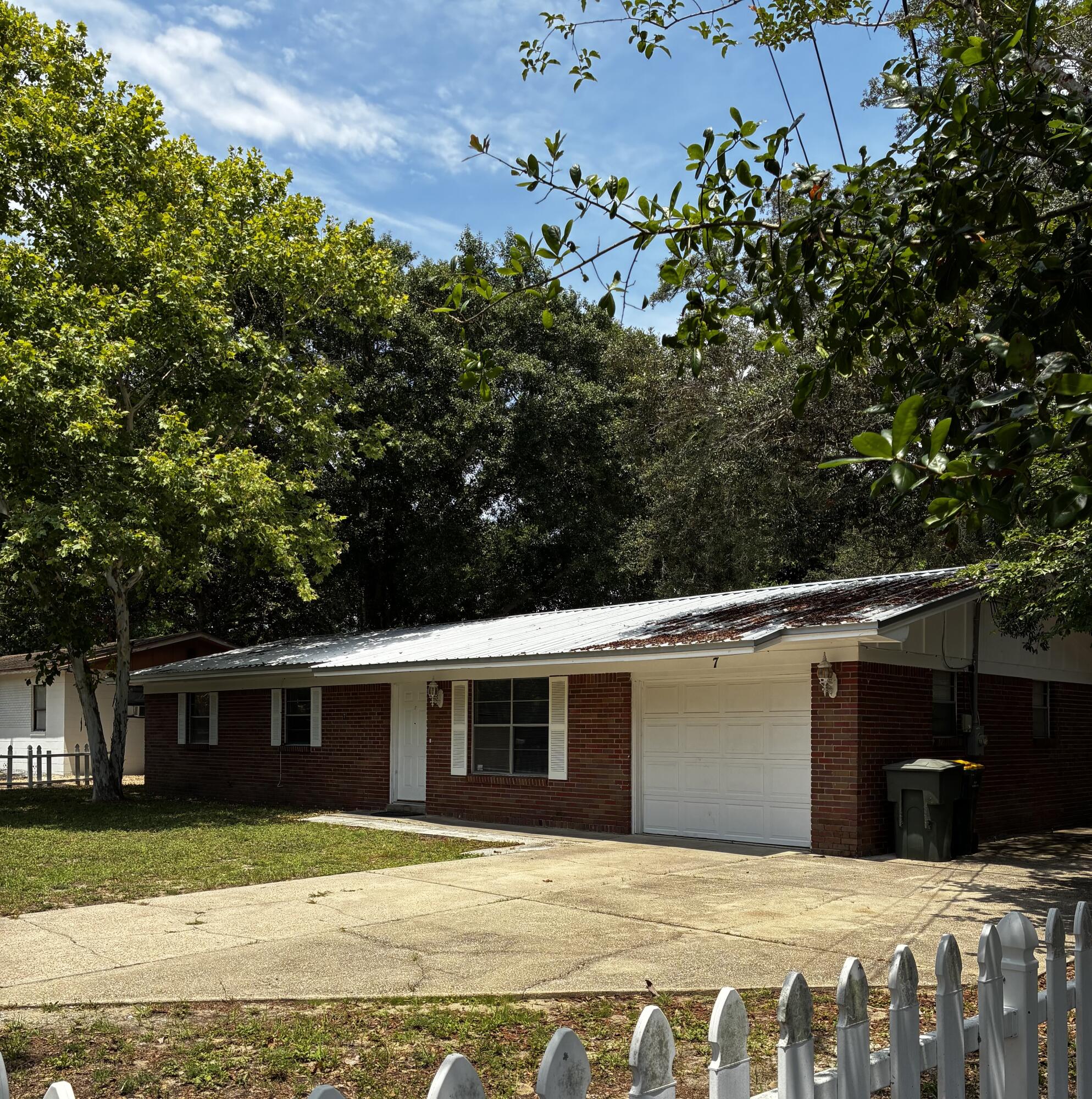 Precious home in Fort Walton Beach. Three bedrooms, two baths. One car garage. Brand new flooring and paint. Large back yard and extra paved parking spot to the right of the driveway. Home is on a lock box, please call our office for instructions.