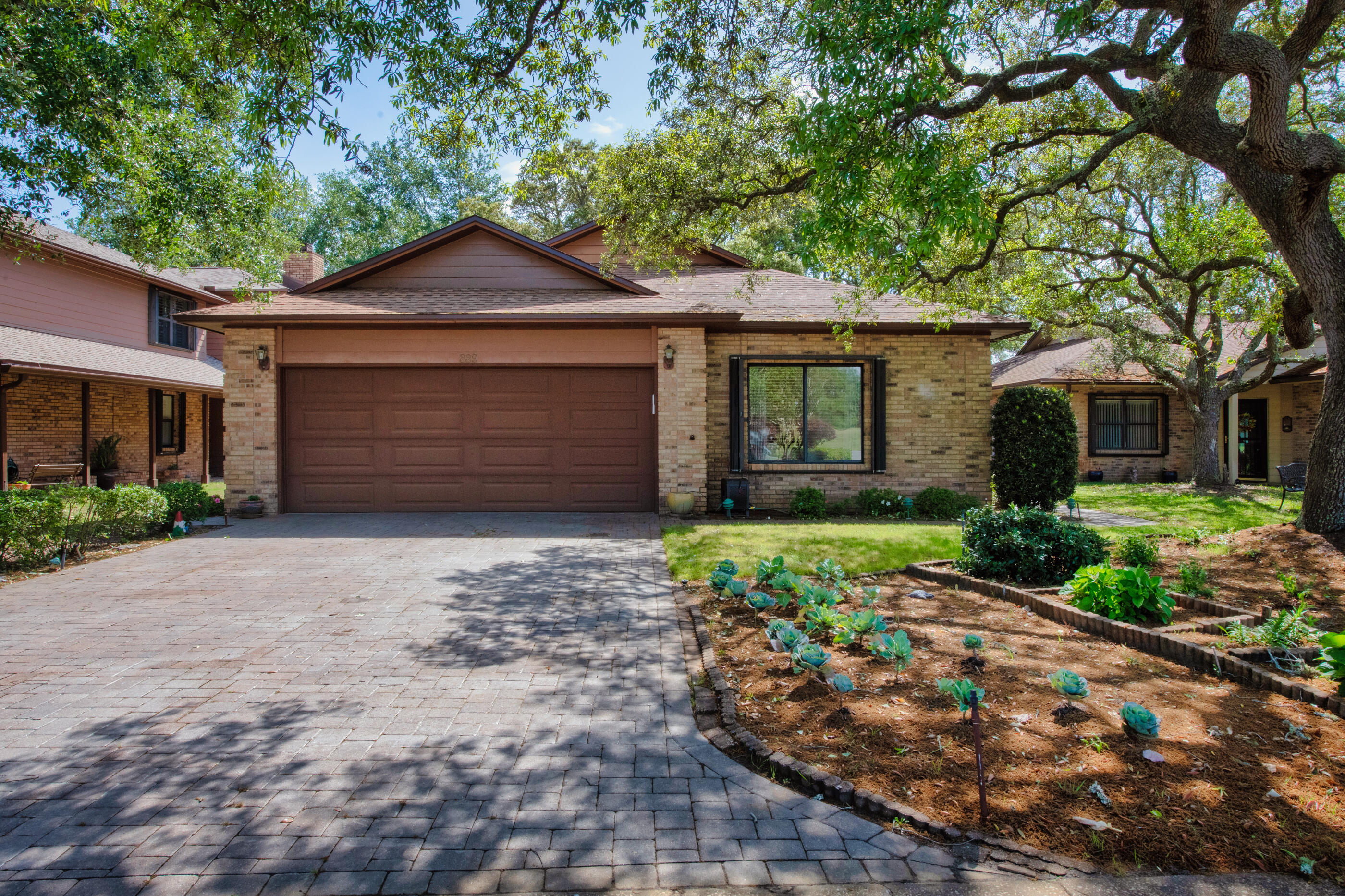 Stunning custom-built home, on the market for the very first time! This immaculate property boasts a large living room featuring vaulted ceilings and a wood-burning fireplace. Storage space will never be an issue with custom cabinets, accented with granite countertops, providing ample storage space. The primary bathroom is a luxurious haven, complete with dual vanities, a walk-in closet, a walk-in tub, a large separate shower, and heated floors. The living, dining, and master bedroom have all been recently fitted with LVP floors, adding a touch of modern sophistication to the home.A bonus room located off the primary bedroom makes for the perfect nursery, office, or playroom. Step outside onto the large covered patio and take in the breathtaking view of the 9th fairway and greens.