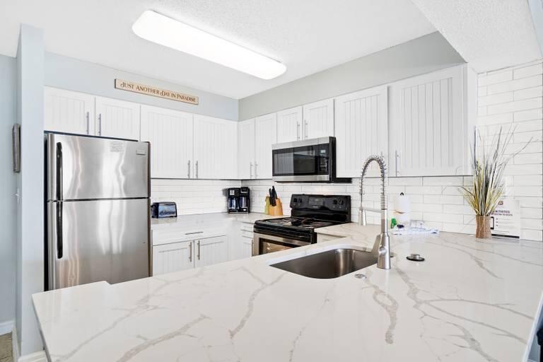 PELICAN BEACH RESORT CONDO - Residential