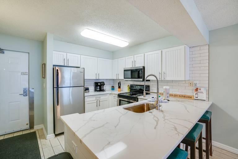 PELICAN BEACH RESORT CONDO - Residential
